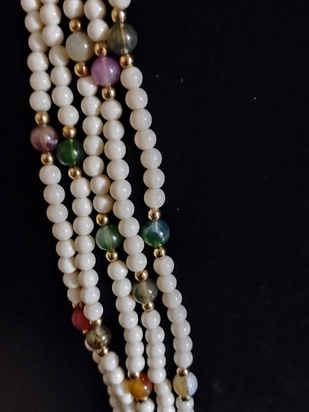 Vintage five strand necklace with translucent accent beads, gold-toned spacers